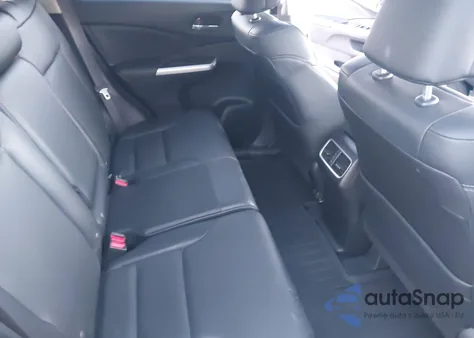 2015 Honda Cr-V Touring z USA, uszkodzony, nr VIN 5J6RM4H95FL109626